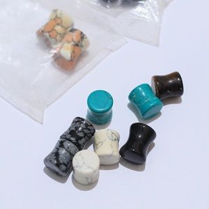 Assortment of 0 gauge stone plugs